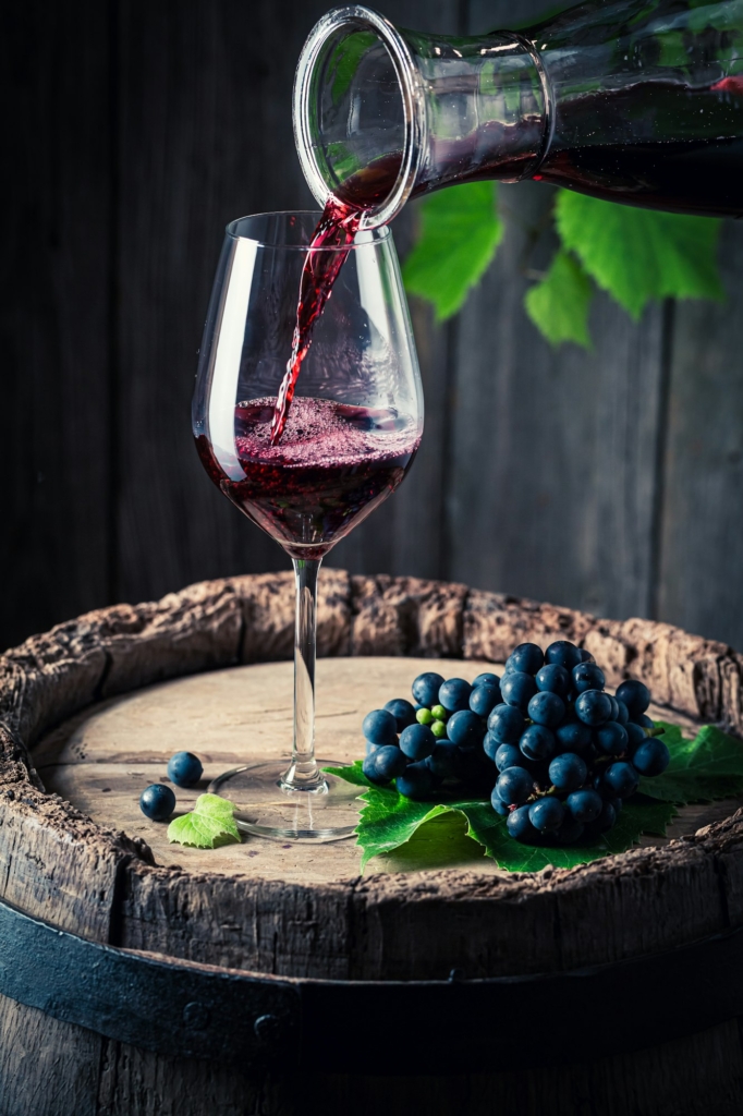 pouring-red-wine-from-carafe-into-a-glass-wine-industry-.jpg